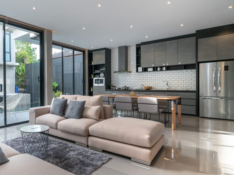 interior home design in living room with open kitchen in the loft house