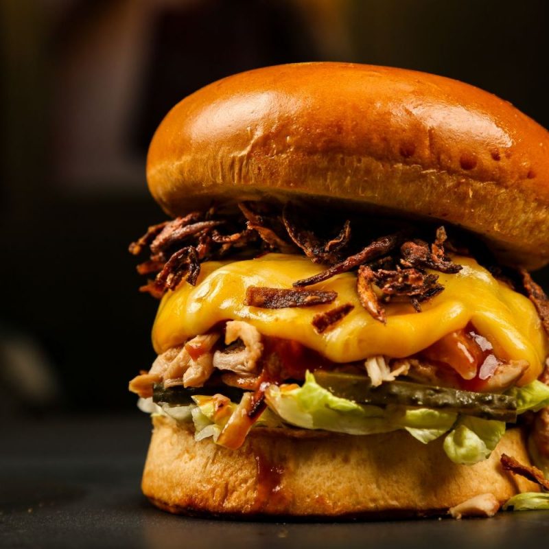 front view burger on a stand